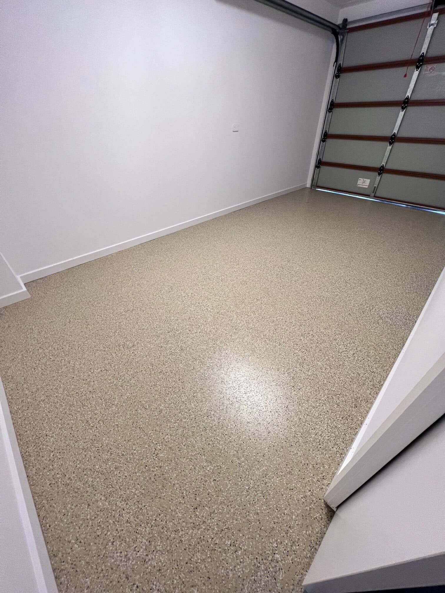 Flaked epoxy garage floor in Adelaide