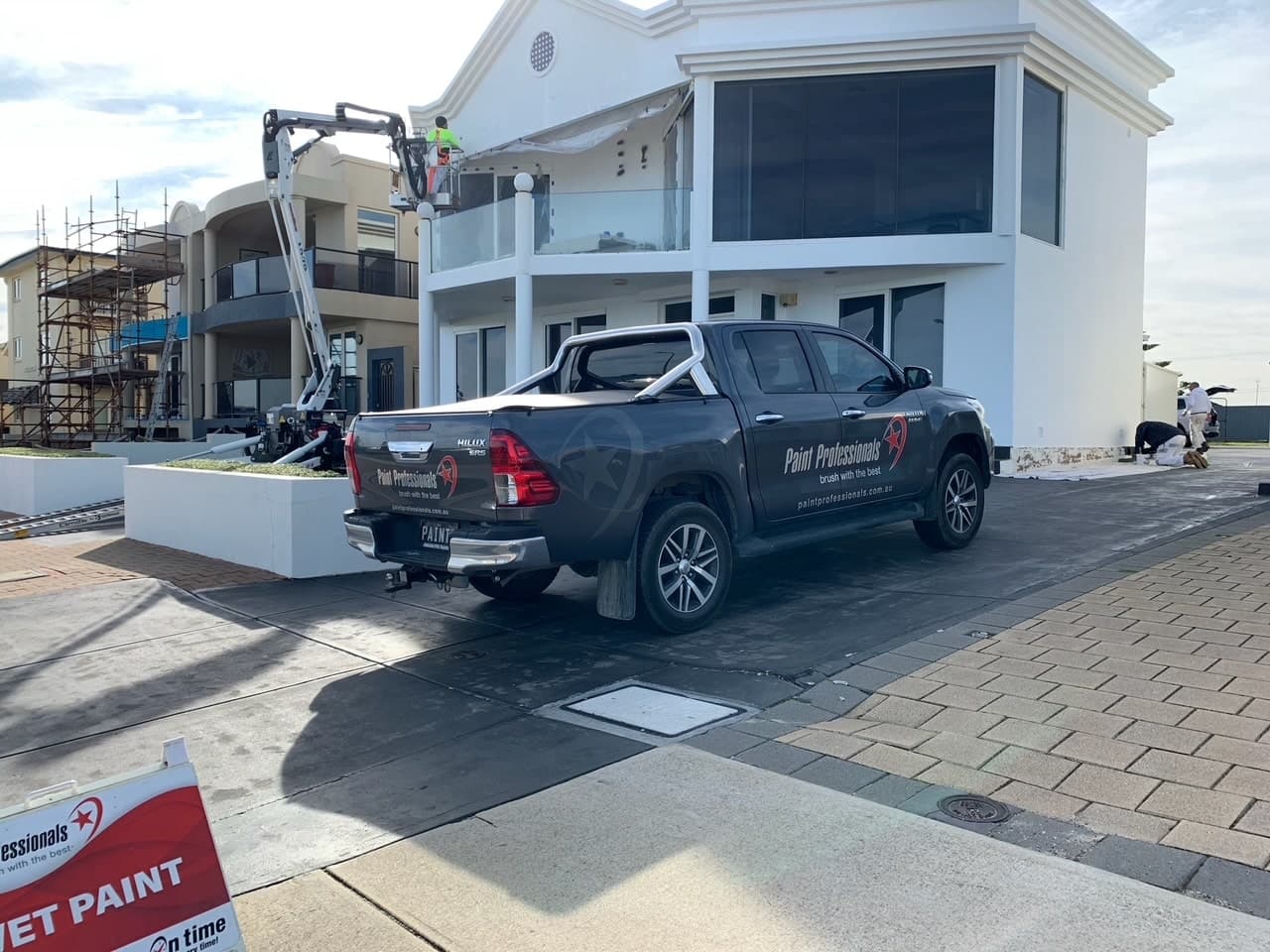 Paint Professionals rope access painter at work in Adelaide